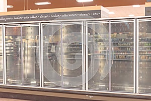 Empty commercial fridges at grocery store in America