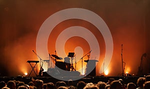 Concert stage on music festival, instruments silhouettes, microphones drums guitars