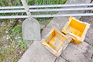 Empty concrete cube molds for compressive strength test of the cement mixture