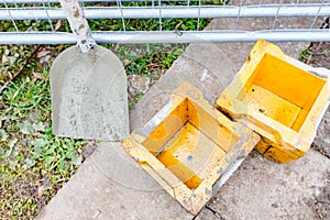 Empty concrete cube molds for compressive strength test of the cement mixture photo