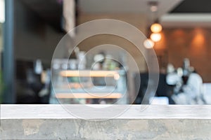 Empty concrete table top with blurred coffee shop