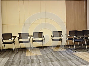 Empty conference room chairs, seats in an empty conference room