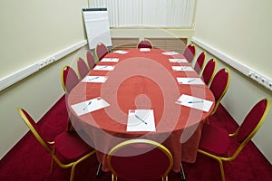 Empty conference room with a red carpet on the