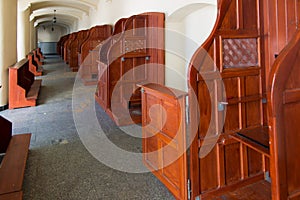 Empty confessionals, a place of repentance and conversion. Inter