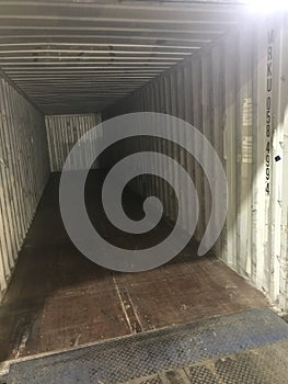 Empty container after unloading parked at the warehouse gate