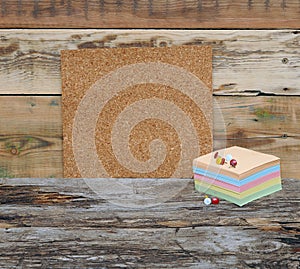 Empty cork board with colorful stack note papers