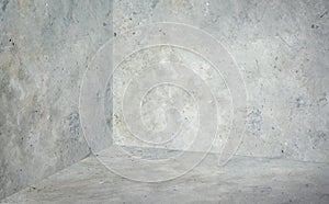 Empty corner room with grey concrete wall and floor background,Mock up studio room for display or montage of product for