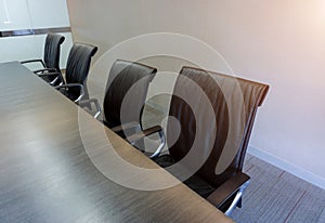 Empty corporate chair in conference room before business meeting