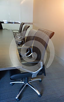 Empty corporate chair in conference room before business meeting