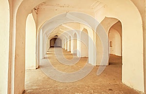 Empty corridor inside the ancient stone palace in India.