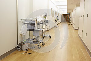 Empty Corridor With Medical Equipment In Modern Hospital