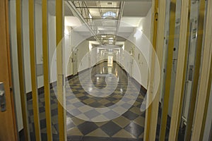 the empty corridor of a prison