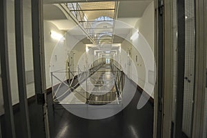 the empty corridor of a prison