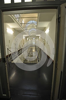 the empty corridor of a prison