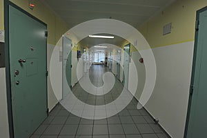 the empty corridor of a prison