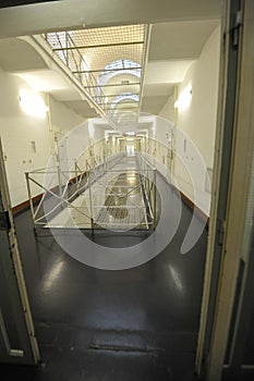 the empty corridor of a prison