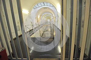 the empty corridor of a prison