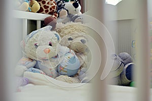 Empty cot with toys