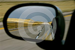 Empty Country Road in Side View Mirror