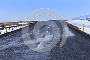 Empty country road in winter day