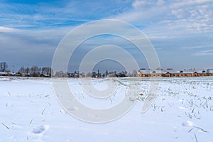 Empty Countryside Landscape in Sunny Winter Day with Snow Covering the Ground, Abstract Background with Deep Look and Dramatic