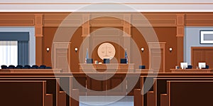 Empty courtroom with judge and secretary workplace jury box seats modern courthouse interior justice and jurisprudence photo