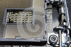 Empty cpu processor socket on motherboard close up macro