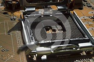 Empty cpu socket with pins on motherboard