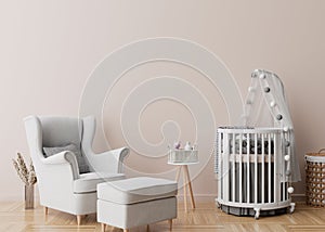 Empty cream wall in modern child room. Mock up interior in scandinavian style. Free, copy space for your picture, poster