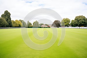 empty cricket pitch with freshcut grass