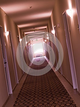 Empty, crooked hotel corridor