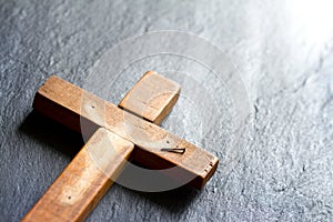 Empty cross with shadow of Jesus Christ abstract resurrection easter background concept