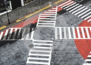 Empty crosswalks on dirty road in downtown during disaster and pestilence