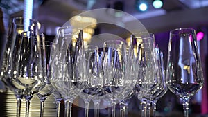 Empty crystal glasses at the table for drinks and alcoholic beverage.