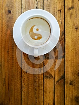 Empty cup of coffee as a symbol of yin yang