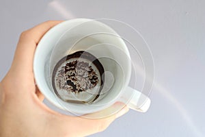 Empty cup of coffee to tell fortunes. Drawing of coffee grounds predicts future