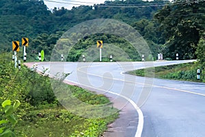 Empty curve road in the mountain and forest, country road in north of Thailand