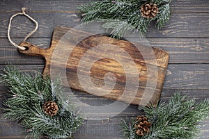 Empty cutting board on a old christmas rustik table