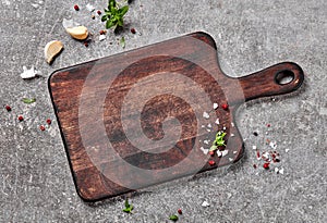 Empty cutting board and spices