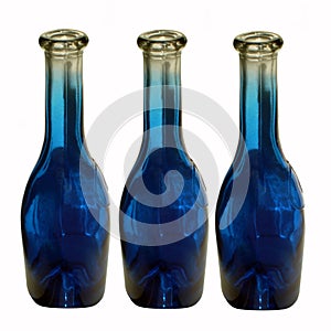 Empty dark blue bottles