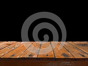 Empty dark wooden top table in front of abstract black background . Can be used for display or montage your products.Mock up for s