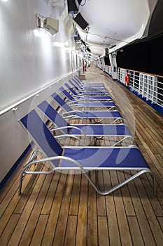 Empty deck chairs on cruise ship