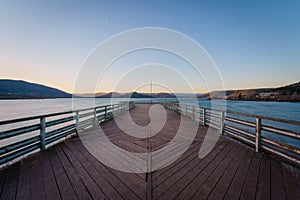 Empty deck walk background by the lake and clear sky in Salagou lake at dusk, France