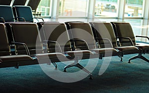 Empty departure airport lounge with new seats