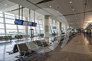 Empty departure lounge in airport photo