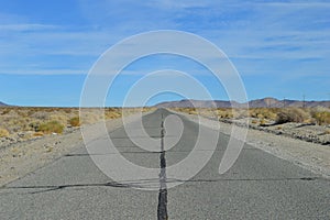 Empty Desert Road Telephone Poles