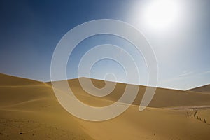 Empty Desert in Sand storm over blue sky summer on Silk Road photo