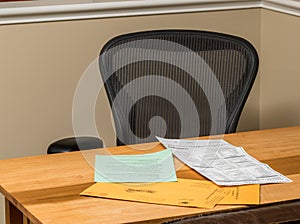 Empty desk at home with the paperwork for completing absentee voting ballot in Presidential election