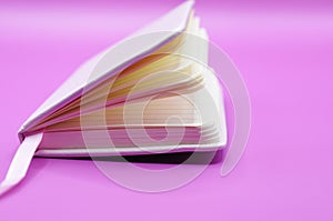 diary on purple background