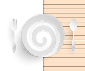 Empty dish, fork and spoon placed alongside.